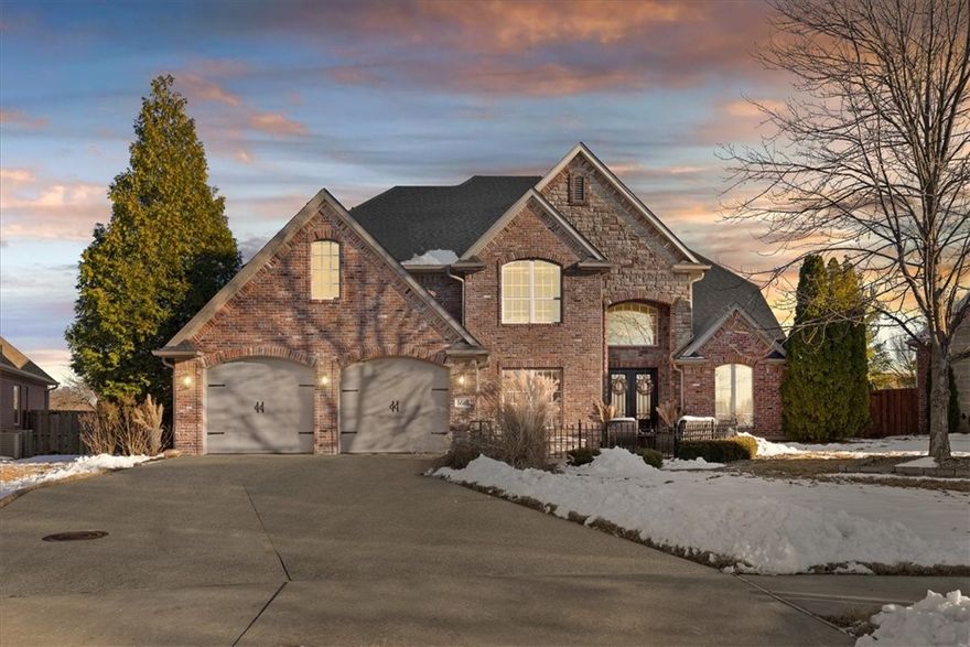 This updated 4-bedroom, 3.5-bathroom home is a true standout, located in the prestigious Shadow Valley Country Club neighborhood. Positioned at the end of a quiet street, it offers unmatched privacy with an open field and wildlife right in your backyard.
Designed for both comfort and entertaining, the home features two spacious living areas. The family room boasts charming wood beams and a striking floor-to-ceiling stone fireplace, creating a warm and inviting atmosphere. A temperature-controlled four-seasons room, equipped with a mini-split system, provides a versatile space to gather with family and friends year-round.
This home has many updates and upgrades. The completely updated kitchen is a chef’s dream, showcasing premium ZLINE appliances, a workstation sink, a beverage cooler, and sleek quartz countertops. Whether hosting a party or enjoying a quiet evening, this space is perfect for both entertaining and everyday living.  Experience the Northwest Arkansas lifestyle everyone’s talking about!