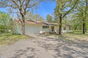 Peak season of lake living is just around the corner - 22 miles from Heber Springs and 12 miles from Greenbrier - this charmer will meet all of your needs and wants! Situated on a little over two acres, you will fall in love with all this 1617 square foot home has to offer - Three bedrooms, two full bathrooms, fabulous open living & dining area featuring a wood burning stove all along with a fully functional kitchen perfect for all your gatherings. Better yet, open up the patio and french doors to have even more entertaining space on the open deck - Yes please!