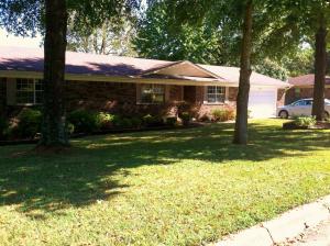 Beautiful West Russellville home with so much to offer including two living areas, formal dining, luxurious kitchen, a gorgeous covered deck, lovely wood floors, and a fireplace. There is a two car garage, a two car detached garage, plus an additional workshop. This home has the address you want, the features you need, and the details you'll love! There is even a new roof!