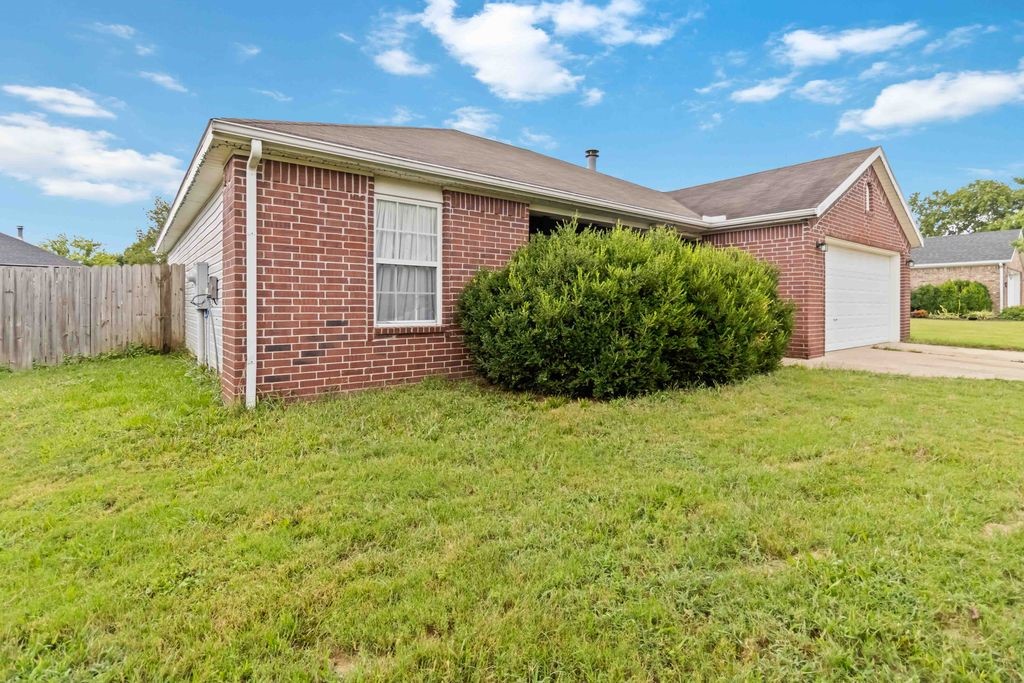 Location, Location! Only Approximately 5 miles from Walmart New Campus! Check out this 1388 sq. ft, 3 Bedroom, 2 Bath, 2 car garage! Includes Wood Burning Fireplace, Electric Range replaced in 2024 and Dishwasher in 2023. Sellers offering a $3000 paint credit. Home is priced to sell AS-IS.