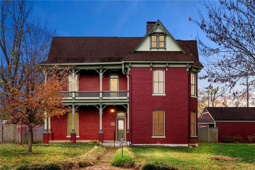 This 4 bed/3 bath historic home, in the heart of Bentonville, has all the charm and details you are looking for! This two-and-half story home has 11-foot ceilings throughout, large central hallways, a curved staircase with an elaborately carved newel post and balusters, original carved woodwork, and hardwood floors.  In addition, this home boasts tall arched windows, 3 wood-burning fireplaces, 2 bay windows, a balcony overlooking Downtown, and an expansive backyard all located on a large corner lot totaling .55 acres.  The brick sidewalk, laid in a herringbone pattern leading from the street to the front porch and wrapping around the house to the 2 backyard patios, is just one of many beautiful, historic details you must see for yourself.  This home, with 14 rooms and an additional, unfinished third story, is located just steps from The Ledger Building, The Momentary, The Bentonville Square, and all that Downtown offers.  You must see this one in person to appreciate all its beautiful, historic charm!