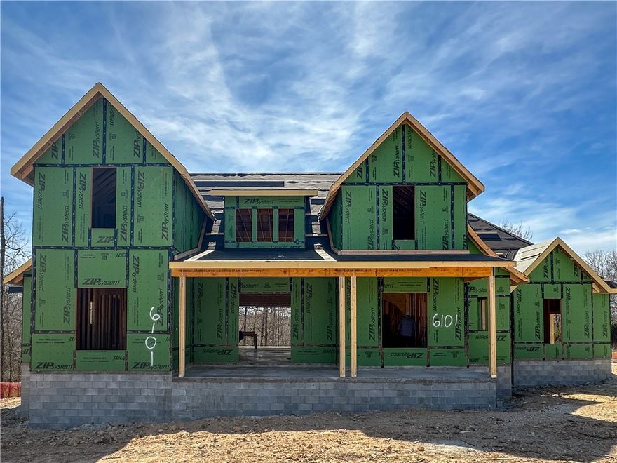 Welcome to this new home in Blackberry Ridge, designed by Lane Crosno Designs. A soaring two-story entry leads into the open living area, where the two-story ceiling continues, and a fireplace and large sliding doors to the back porch create an inviting, light-filled space. The kitchen features a large island, quartz countertops, KitchenAid appliances, and a walk-in pantry for the refrigerator, microwave, and appliance garage. The dining room includes a wet bar with a sink and mini fridge. The main-level owner’s suite offers a vaulted ceiling, walk-in closet, and spa-like bath with dual vanities, a freestanding tub, and a walk-in shower. An additional bedroom or office and laundry room complete the first floor. Upstairs are three bedrooms with vaulted ceilings, two baths, and a catwalk overlooking the living room. Relax on the covered porch, complete with a gas hookup. The three-car garage is prewired for an EV charger. Situated near the pool and pavilion, with protected common space behind it. *Agent Owned*