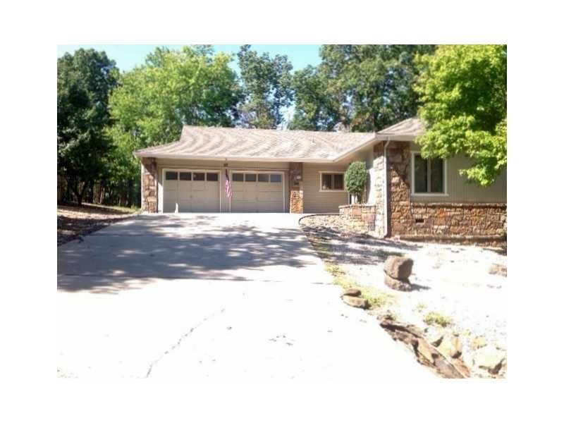 Easy access "close in" Highlands location! Many updates and new corian counter in kitchen w/ Jenn-aire oven & cook top. Casual breakfast area & Formal dining w/ gorgeous built in buffet cabinet w/ pretty glass doors. Large master bdrm,lots of closet,wood floors in 3rd bdrm (currently used as TV area/ office), HUGE 392 sf covered screened in porch. Oversized garage W/ cabinets & cedar closet. Surrounded on 2 sides by common area. Dbl doors under house to concrete pad too. Riding lawnmower will stay!
