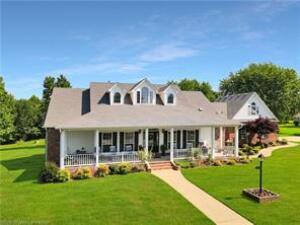 Come home to the country. This property is loaded with features such as 2 beautiful, homes, 40x60 shop, stocked pond, 2 wells and gorgeous landscaping all on 40 acres. First home is a custom-built filled with luxurious amenities. Enjoy a sunrise from the front porch or relaxing in the back yard oasis complete with pool. Home comes equipped with back-up generator. Next home is a 3/1 perfect for guest house or income potential.