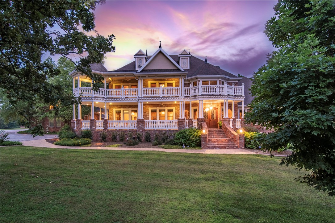 Behind custom gates resides an artistically crafted estate on over 30 beautiful Northwest Arkansas acres.
Glowing with southern charm, this property exudes an abundance of five-star features and amenities. An affluent hostās paradise with a seamless blend of indoor & outdoor entertaining. Enchanting features and designs include Australian cypress hardwood floors, Italian marble, and a stunning repurposed stained glass window to showcase the grand scale of this home.
A well thought out energy efficient, low maintenance home with so much to offer including your own theatre, game room, spa retreat, gym, and wine cellar provide the perfect modern family atmosphere.
Endless possibilities for this property include hosting weddings & large events. The acreage lends the ability to be a small cattle or horse farm, with a 50x60 barn and pond. The 1100 sqft apt. is great for overflow guests or could also be an excellent income producing rental. Private country life is only 19 min. from downtown Bentonville! See MLS 1195677
