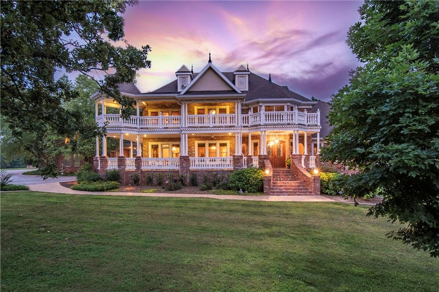 Behind custom gates resides an artistically crafted estate on over 30 beautiful Northwest Arkansas acres.
Glowing with southern charm, this property exudes an abundance of five-star features and amenities. An affluent host’s paradise with a seamless blend of indoor & outdoor entertaining. Enchanting features and designs include Australian cypress hardwood floors, Italian marble, and a stunning repurposed stained glass window to showcase the grand scale of this home.
A well thought out energy efficient, low maintenance home with so much to offer including your own theatre, game room, spa retreat, gym, and wine cellar provide the perfect modern family atmosphere.
Endless possibilities for this property include hosting weddings & large events. The acreage lends the ability to be a small cattle or horse farm, with a 50x60 barn and pond. The 1100 sqft apt. is great for overflow guests or could also be an excellent income producing rental. Private country life is only 19 min. from downtown Bentonville! See MLS 1195677