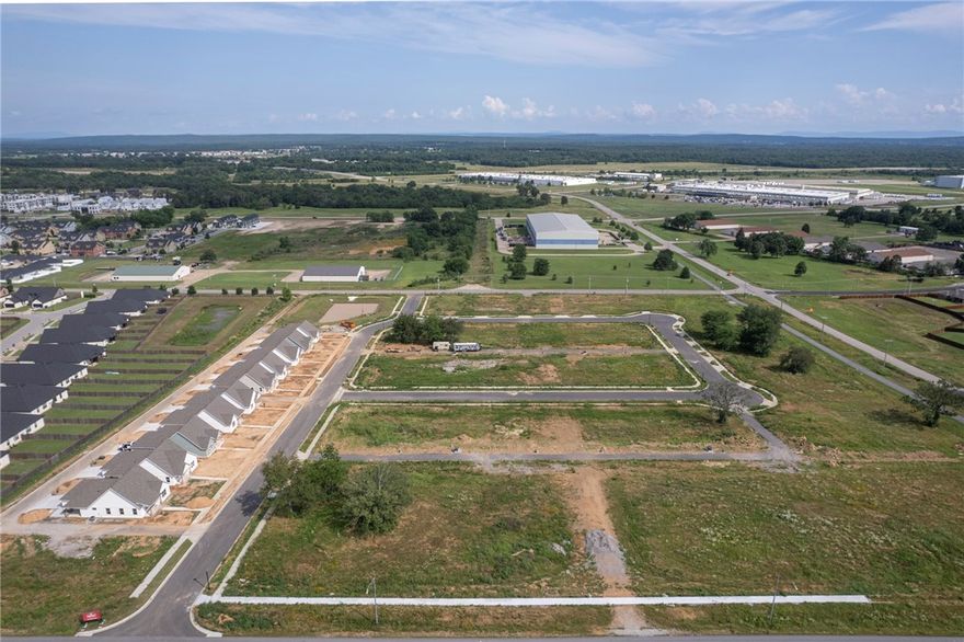 Now offering four buildable lots in Fort Smith’s desirable Chaffee Cottages subdivision—available individually or as a package. This featured lot sits at the front entry of the neighborhood, providing premium visibility and easy access. Each lot offers a flat, build-ready site with utilities in place, surrounded by thoughtfully designed homes that have helped establish the area’s reputation for quality and charm. With demand strong for affordable new construction in Fort Smith, these lots present an ideal opportunity for builders or investors to expand their portfolio with proven product in a growing community.
