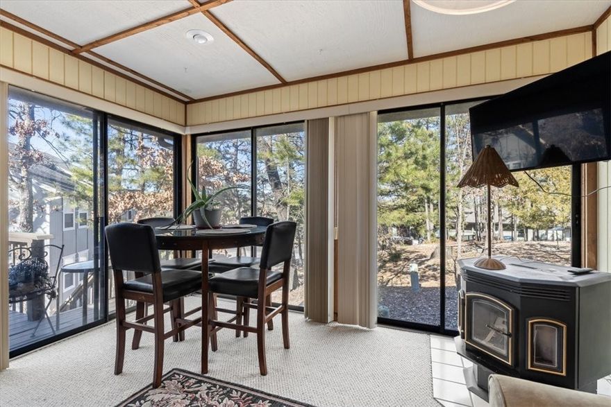 Lake Rayburn very short walk! Small view of the lake at certain times of the year. Great Townhome! Covered porch which is a Fun sitting area. This Covered Porch leads to the Entry. Stepping inside you experience a large open living area. (Superb visiting area.) Total view of kitchen with real wood cabinets and lots of counter space plus Window over the sink. Breakfast Bar, glass style backsplash, pantry and desk area.  Just ahead and a little to the right a gorgeous sunroom with walls of glass. Deck just off the sunroom. Extra storage closets in this area. 3 nice sized bedrooms and 2 full baths.