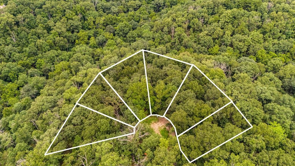 Own the Whole Cul-de-Sac ā Your Private Slice of Bella Vista Paradise! Dreaming of building your home with no neighbors next door and private views year-round? Hereās your chance to claim a rare find in Bella Vista ā six adjacent lots totaling 1.84 acres, tucked at the end of a peaceful cul-de-sac. Yes, the entire cul-de-sac can be yours! Backed by POA land, enjoy serene, wooded views ā even in winter. And for the outdoor lovers? The Back 40 Bike Trails run through the valleys just behind the lots. Ride out. Ride home. Repeat. One lot has been perc-tested for a 3-4 bedroom home, and all six have been professionally surveyed - ready for building after clearing. Whether you're planning a private estate, family retreat, or simply want space to breathe, this rare opportunity has you covered. Bella Vista living. Total privacy. Come walk your future cul-de-sac - and imagine the possibilities.