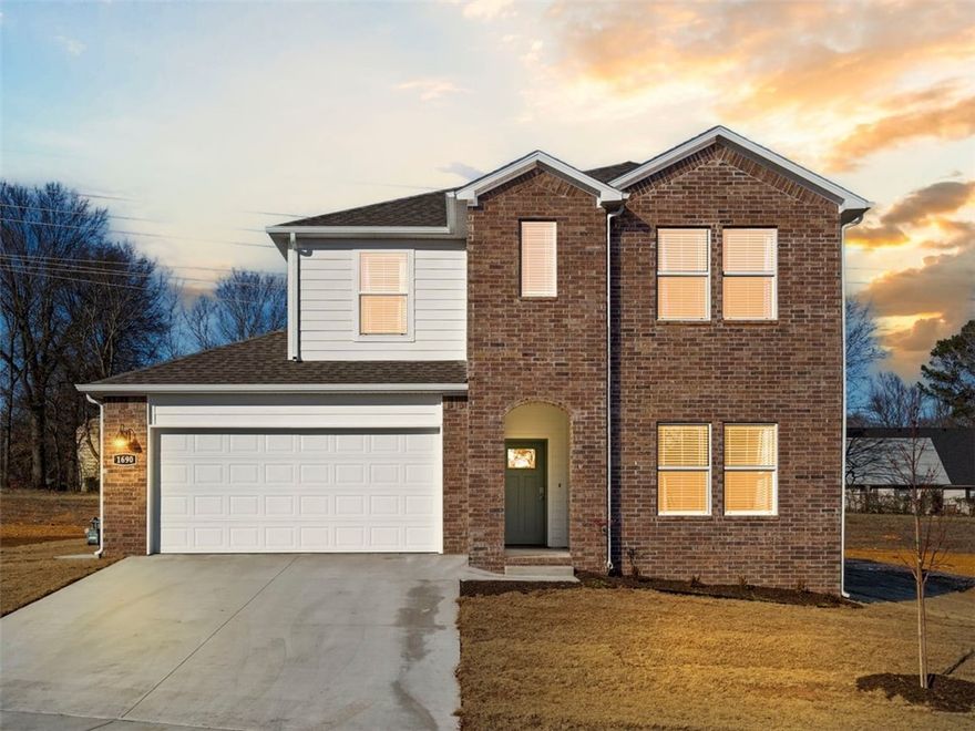 The Naples Plan is a two-story floor plan with 2390 square feet. It has a lovely living area, kitchen, primary bedroom with massive closet, oversized shower and dual sinks. There is a secondary bedroom down with 2 bedrooms and a game room upstairs! Nature Walk is located in Springdale. These brand-new homes will be 4-sided Brick!  Living room will showcase a beautiful and modern Electric Fireplace with Poplar Mantle. Homes will have LVP and Carpet. Kitchen will have 36-inch cabinets, lovely appliances and quartz countertops and tile backsplash.  Ceiling fan in the living room.  Primary bedroom has a fabulous en suite, dual sinks, with an oversized walk-in shower with tiled walls and elongated commode. LED lighting throughout. High efficiency AC with programmable wi-fi thermostat. Front, side and PARTIAL back sod only. Come find your dream home today! Garage Door Opener! Taxes and Parcel TBD.