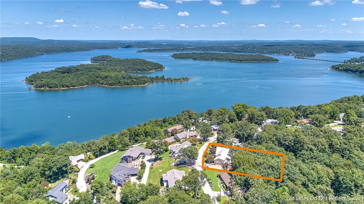 Immaculately Maintained & Updated Beaver Lake Area Home with Seasonal Views & Outdoor Oasis. Beautiful, updated 4-bed 3-bath home nestled in a peaceful lake area community above Prairie Creek. The charming, spacious & inviting layout is perfect for both relaxation and entertaining. Enjoy your morning coffee in the stunning sunroom, offering tranquil views of the beautifully landscaped & wooded backyard & serene koi pond. Step downstairs to a private outdoor entertainment area & hot tub on the large deck & a separate stone patio w/electricity—perfect for gatherings, grilling, or cozy nights under the stars. Inside, you'll find tasteful updates throughout, combining modern comfort with timeless appeal. 2nd primary bed & bath upstairs. Downstairs, a finished, heated & cooled basement room makes the perfect space for a home gym, hobby room, or private retreat (not included in sq ft). Don’t miss this rare opportunity to own a well-cared-for home in a coveted location that blends peaceful nature with practical amenities.