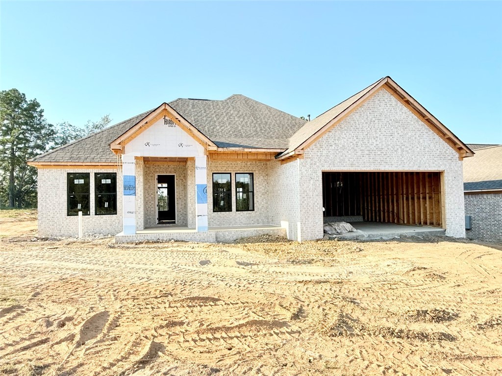 Currently under construction. Lot 8 on Elk Horn in Scenic Way Village is a 2,096 square foot new construction home on a spacious lot just minutes from Lake Dardanelle State Park. This functional 4-bedroom, 2-bathroom home includes a 2-car garage and an open-concept layout ideal for modern living. The large living room features a fireplace and flows seamlessly into the kitchen and dining area. Off the kitchen is a walk-in pantry, and just around the corner, you'll find a generous utility room and mudroom for added convenience. Scenic Way Village offers peaceful living with quick access to downtown Russellville and local amenities.
Plans are subject to change at the builder’s discretion.