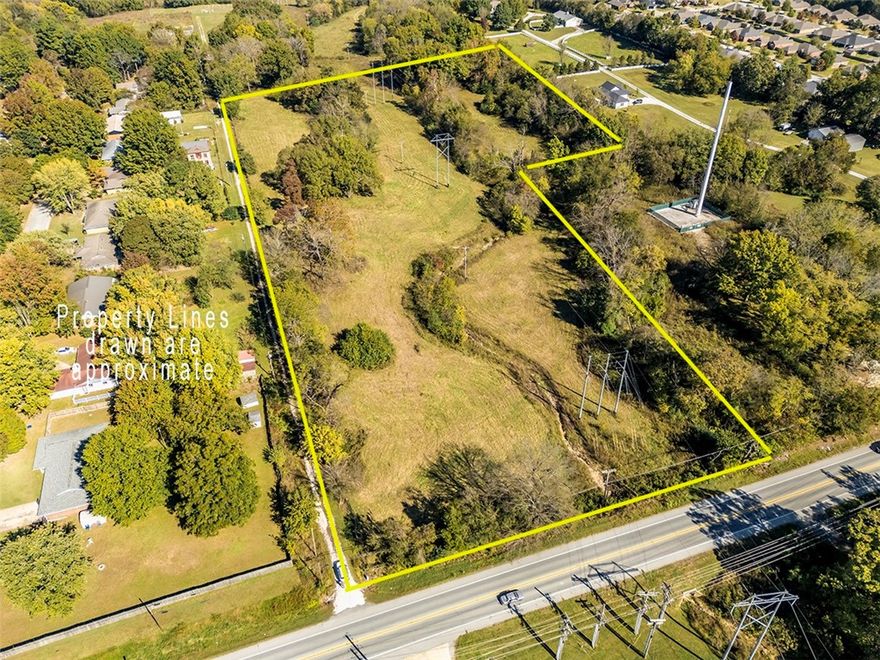 Great 10+ acres in a fantastic location right on Hwy 16 (East Huntsville)! Build your own private estate or hobby farm and love the easy access to all things Fayetteville and Elkins! All utilities are available onsite or at the property line. New survey available. There is a spring feeding into a small creek running through the middle of the property (only about two acres total is in the flood zone due to the creek). Lot of spots to build on! Plenty of trees providing shade and privacy.