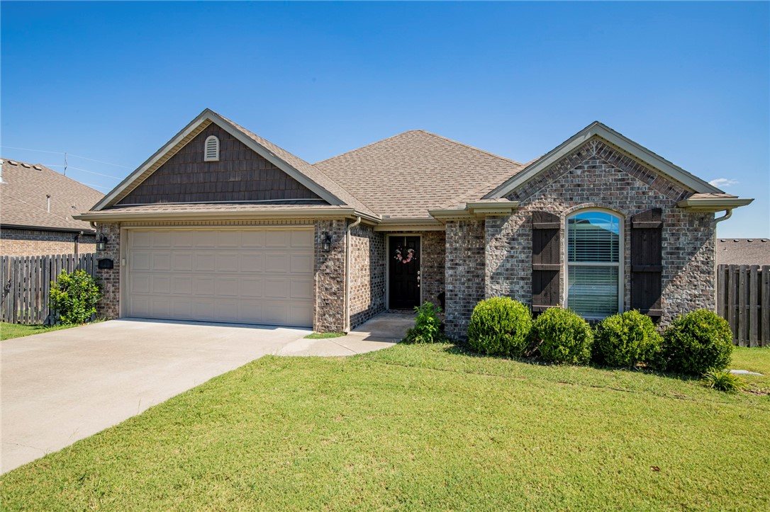 Nicely maintained all brick home in a quiet neighborhood. Split floor plan. Kitchen boasts granite countertops, stainless steel appliances, and a pantry. The living room is a haven for relaxation, featuring elegant crown molding and a cozy gas fireplace that adds warmth and character. Step onto the small deck and enjoy the backyard's natural beauty, complete with an Arkansas Black Apple Tree, offering a delightful treat for your taste buds. One owner. Enjoy a fresh look with new paint and vinyl plank flooring in the main living areas.