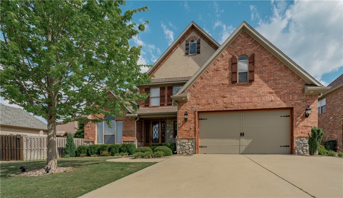 Desirable Gated Golf Course Community in Bentonville school district. New Roof 2020 HVAC 2016. This beautiful home has an open floor plan with wood floors throughout the main level, tile in wet areas. Spacious kitchen with gas cooktop, pot filler and upper glass cabinets . Main floor master suite with lots of natural light and 2 walk in closets. Separate office and formal dining room. 4 bedrooms plus a bonus room. Backyard is great for entertaining with a covered patio extended hardscape with fire pit and plenty of yard. Established landscaping creating a privacy feel. This home includes a social membership.