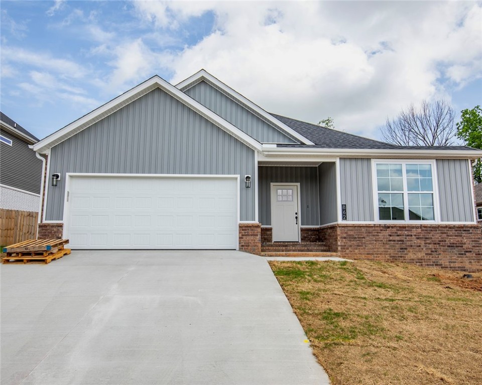 Very appealing, very beautiful 3 BR, 2 BA brand new brick home - come see this one! It is near the top of the beautiful Mountain View Estates Subdivision with a great view and all you could want inside and out! Very well appointed with outstanding colors and finishes. The floors are luxury vinyl plank flooring, split floor plan, gas log fireplace, energy star appliances, covered patio, blinds, gutters and more!