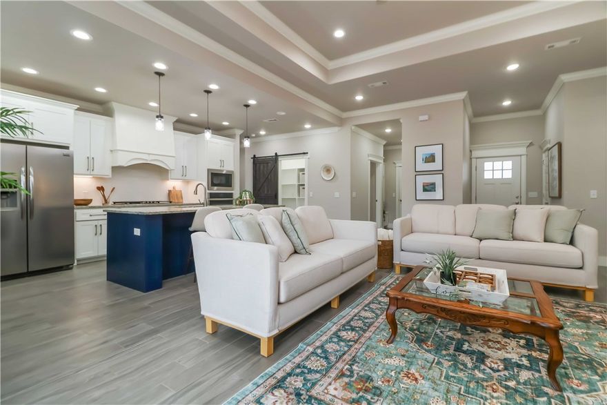 This home truly checks every box and then some. This 4-bedroom, 2.5-bath property sits on a spacious .26-acre lot and offers everyday function and comfort.
Inside, you’ll love the open, easy flow with gorgeous wood-look tile throughout the kitchen and living areas. The kitchen is a standout with a gas stove, plus an extra-large, easy-access pantry that makes storage and prep a dream.
The primary suite has a thoughtful layout that includes direct access to the laundry room from the master closet.  Secondary bedrooms are generously sized, offering flexibility for guests, kids, home office space, or hobbies.
Outside, enjoy a covered back patio ideal for morning coffee, a fully fenced yard for pets or play, and plenty of room to breathe. Add in a 3-car garage for all your vehicles, tools, and toys, and you’ve got a home that is practical!
Come see why this one is so easy to say yes to.