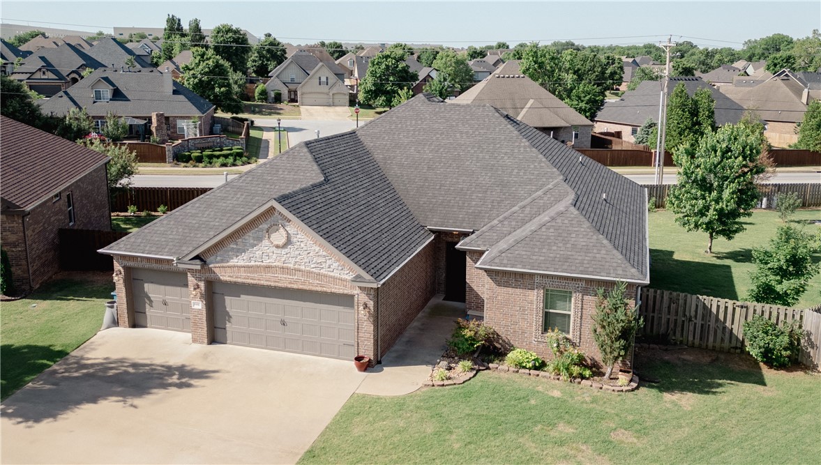 Tucked at the end of a cul-de-sac in Willowbrook, this home comes with fully paid-off solar panels and a gas-powered generator—comfort and efficiency from day one. Built in 2015, the open layout flows out to a freshly painted covered deck and a fenced yard with a storage shed. Inside, you'll find granite surfaces, hardwood floors, and a 3-car garage loaded with built-in shelving that stays with the home. Bonus: a double battery backup keeps the solar power running strong. Move in and plug right into peace of mind.
