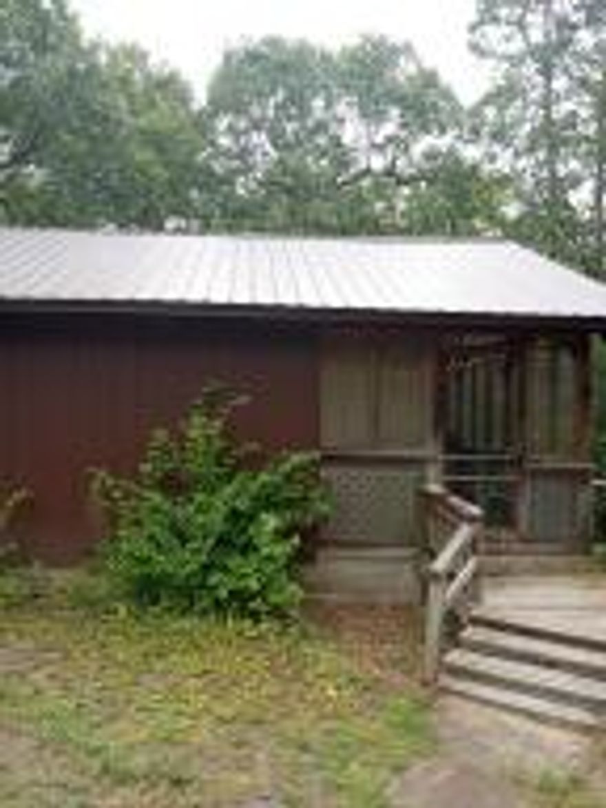 Ready to get away for the weekend and relax near the lake to fish and hunt!!  Or even better move into this 2 bed, 1 bath home with all the home furnishings inside and out included but not not limited to refrig and washer and dryer will convey with the property!!!  Screened in porch with patio furniture & propane grill!!   House is within walking distance to Lake Nimrod and Ouachita National Forest. Very quiet area.  A must see to appreciate.