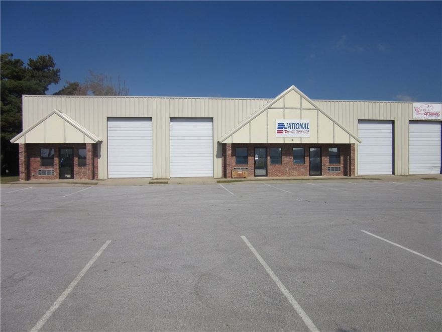 Warehouse space with 2,400 sf includes one office and restroom, one roll up garage door.  Great location within 5 miles from I-49.
