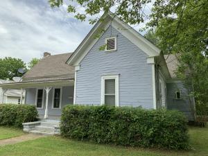 Historic Victorian in Downtown Clarksville next to Spadra Creek Nature Trail perfect for the outdoor enthusiast. Established shade-lot (over 1 acre) w/ an array of outdoor living space including a front covered porch, sun deck, and covered patio. Spacious w/ 3BR, 2BA's, bonus room, formal dining, and large laundry. Lots of kitchen cabinetry as well as a breakfast bar. New roof 2012. Much original including the tall ceilings, trim, FP, and moldings. Owner recently repaired subfloor in kitchen, bath, dinning, and added new floor coverings.