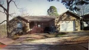 Peace, quiet, private, back to nature and self sufficiency are just a few of the healing qualities available in this 2 BR/2 BA, full unfinished basement home, located on 15 mostly grass covered acres with small barn, chicken house,, giant deer proof garden, pond, previous mobile home site that had spring water to it, elevated deer stand with electricity and a countryside view. The interior of the home is all wood with above normal custom built kitchen cabinets. One car garage up and a 13 x 46 garage in lower level. Viewing this property is an experience not easily forgotten. Located in the Ozark Nat'l Forest area in the heart of wildlife, close to the giant trout fishing on the White River. If you need healing in your life, during this troubled time, look no further.