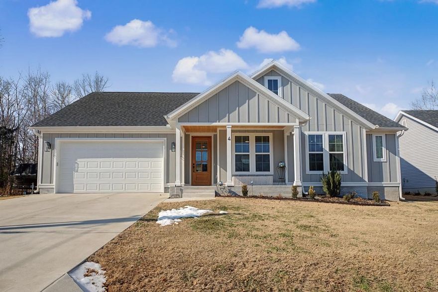 Welcome to 4 Hobkirk Drive... this "almost new" 3 bed, 2 bath, single story home has high end finishes and quality workmanship throughout. Enter the home to a beautiful foyer with natural light & wood flooring. Living room is at the heart of the home with an open concept design, wood beams, gas fireplace & large, picturesque windows. Kitchen features 3CM quartz countertops, white cabinets, open shelving, stainless steel appliances, soft close doors & drawers and plenty of storage space. Spacious primary suite has a double vanity, walk-in closet & a huge walk-in tiled shower. Backyard is flat & has secondary access from the road behind the property. Enjoy summertime from the covered back patio & the private 8,000-gallon pool. The 2-car garage is finished out with cabinets & shelving. Mud room conveniently located between garage, kitchen & laundry. Close to Branchwood Rec Center, Scottsdale & Highlands Golf, Lake Loch Lomond.