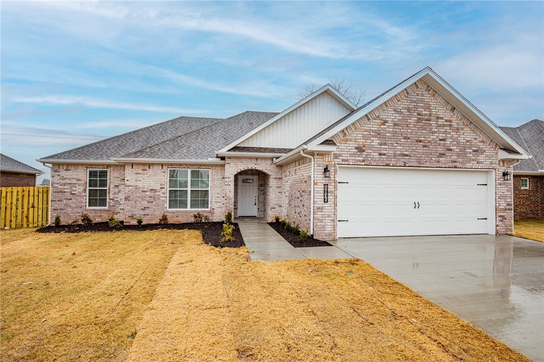Beautiful home in the New Hazelton Heights Subdivision! Located directly behind the new Pea Ridge High School and only minutes from Bentonville. This 4 bed 2 bath home features wood style vinyl flooring and tile, all brick exterior, open living, crown molding, 2 inch blinds. Kitchen includes granite counters, gas range, stainless appliances and large pantry. Livingroom has beamed ceiling and gas fireplace. Mater suite features separate tile shower and soaking tub, double sinks and large walk in closet. Covered patio and fenced yard.
