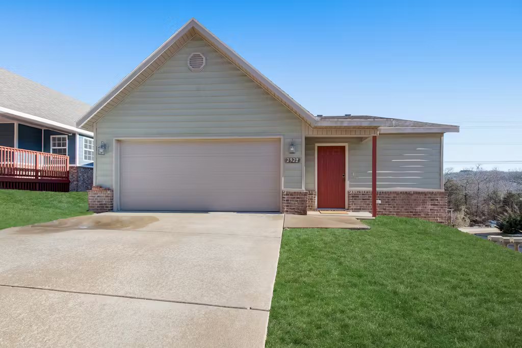 Freshly renovated! 3 Bed, 2 Bath. near the U of A! Fantastic location. Rents for $1,750 without furnishings and $1,950 completely furnished. Complete with cookware, laundry/mud room 2 car garage. Master suite has a new king bed and a large walk-in closet. Master bathroom has a soaking tub / jacuzzi and a separate shower. Bedrooms have nice closets and share a bathroom with a combination shower/tub. Bedroom 2 has two twin beds. Bedroom 3 has a full over twin trundle bed. The home is tastefully decorated. Everything in the home is new. The house is at the base of Centennial Park, which is perfect for mountain biking and hiking/running. Easy access to the interstate and the university Many stores and restaurants nearby (and it's a very short walk to Walgreens and several restaurants), all while being in a quiet and clean neighborhood (cul-de-sac) with plenty of green space and woods nearby. Options for short term leases are available as well.