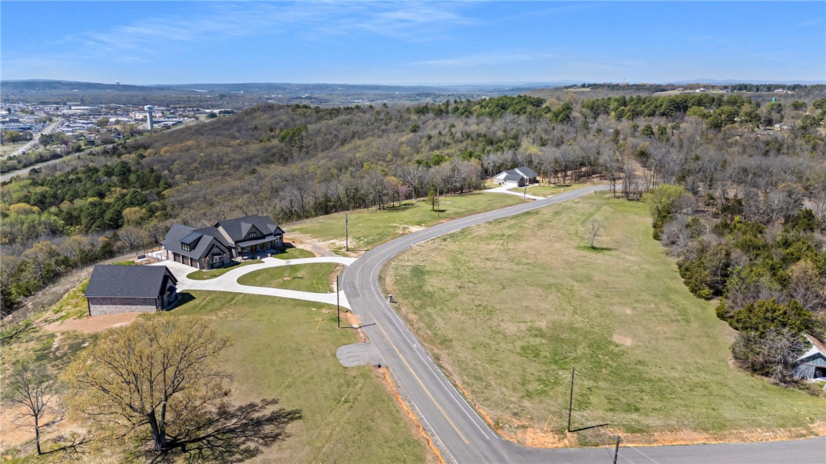 LOT #28 (3.69 Acres) Corner Lot! Oversized Lot with potential galla creek lake views! The newest Subdivision in Russellville, Eagle Crest! Seller is willing to Owner Finance! 7.5% Interest Rate -With approved credit- First time on the Market. This property is right beside Richland Hills, Cove Landing and Cliff & Stream. Just minutes from town with amazing views of Galla Creek Lake, Russellville and you can even see Mtn Nebo. These will not last long at all. Schedule your showing today. Fiber Internet
