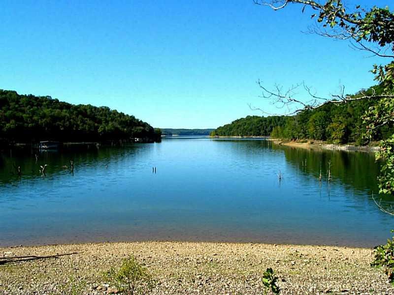 201 acres M/L lakefront Beaver Lake. Around a mile of easy access shore line, 3 parcels, multiple waterfront sites close to water's edge, 3 large areas zoned for boat docks, 1 access point off Pullum Rd & 2 add'l points of access RR Cut, great hunt & fish.