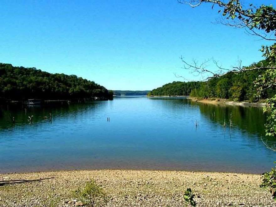 201 acres M/L lakefront Beaver Lake. Around a mile of easy access shore line, 3 parcels, multiple waterfront sites close to water's edge, 3 large areas zoned for boat docks, 1 access point off Pullum Rd & 2 add'l points of access RR Cut, great hunt & fish.