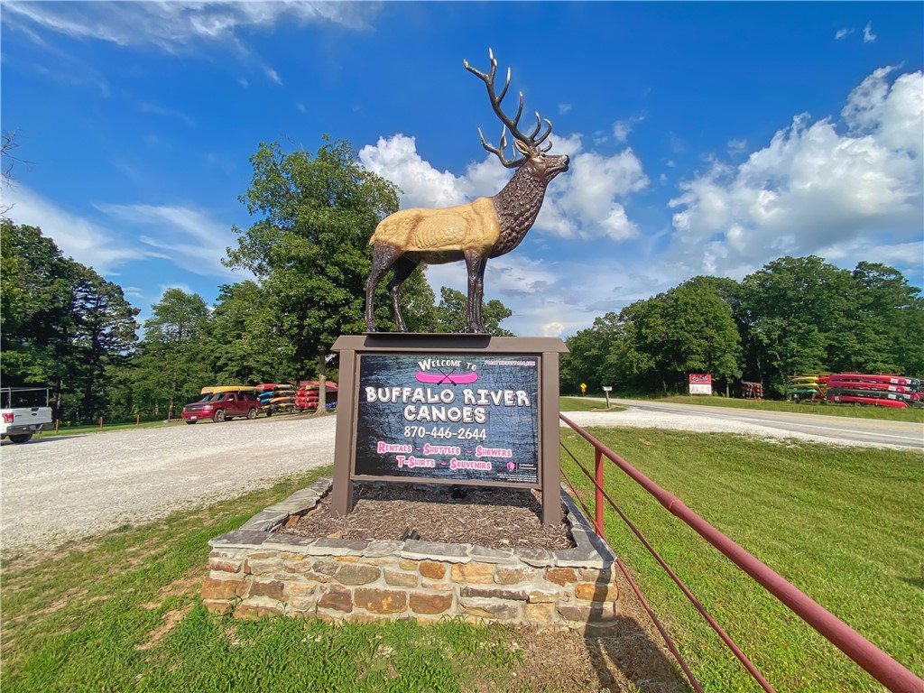 Buffalo River Canoes is an Authorized Concessioner of the National Park Service on the Buffalo National River, holding 132 canoeing permits with a 10 Yr Contract. Strategically situated at the junction of Hwy 74 & Kyles Landing Rd (5 mi from Jasper) near Kyles Landing Access Point/Campground (2.6 mi) & Triple Falls Waterfall. High traffic count location. Located on 2 ac. The main bldg features 1600SF retail space, 800SF offices/restrooms, 2400SF unfinished basement (with 400SF finished living quarters) & 1200 SF of decks/porch. Property includes Bathroom/Coin operated shower house (24 hr access), 1800SF Maint Shop and Koolaire 300 lb ice maker. Business property includes 65 Canoes (Old Town, Wenonah, Mad River), 63 Kayaks (Jackson, Rivieras, Regal, Rivi T), 10 Rafts (Aire, Star), 250 Lifejackets, 200 Paddles, 3 Raft Trailers, 8 Canoe Trailers, 4 Kayak Trailers, 2016 ¾ ton Chevrolet Truck, 2012 ¾ ton Chevrolet Suburban, 2020 Ford Transit 15 passenger Van, and life sized cast aluminum Elk Statue and retail inventory.