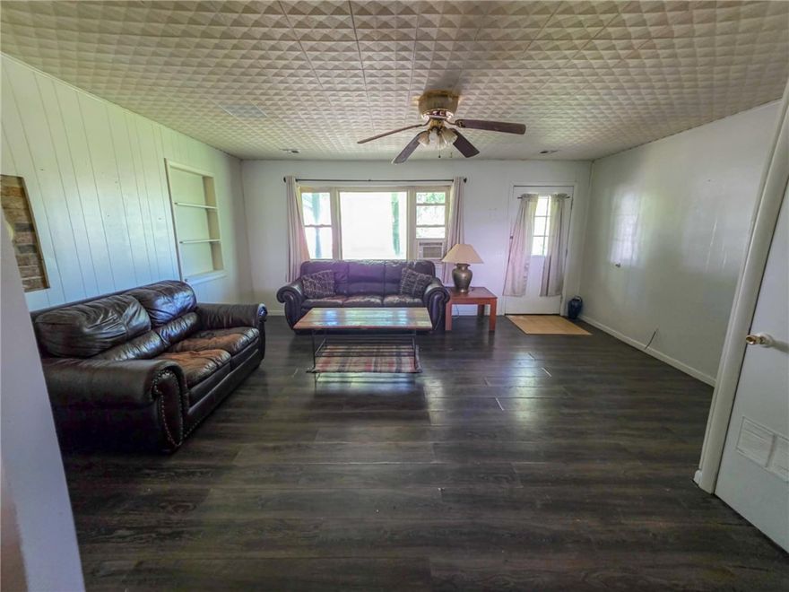 Fixer Upper about 10 min from the University! This cute home has potential and it's situated on a private road with a few other homes so it has very little traffic. This is not ideal for a first time home buyer as it needs an overhaul including but not limited to plumbing and potential foundation repairs, on top of redoing the kitchen, bathrooms, flooring (including subfloor), some siding, etc., Roof appears to be in good condition but may need a rafter replaced. Cash buyers only.