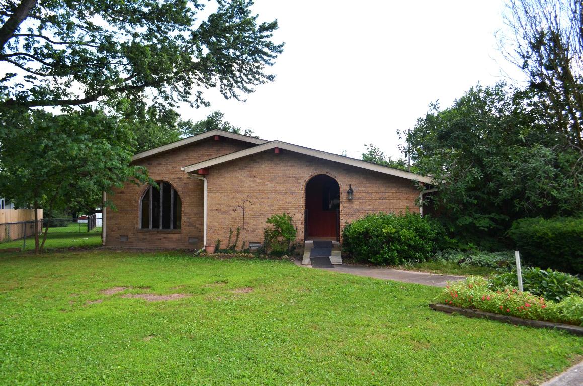 This is the seller's childhood home. Many great memories are left in this house, but it was time to move on. Now, you and your family can start making memories of your own. This is 3-bedroom 2 bath home at the end of a quiet cul-de-sac. It sits on 4/10s of acre so it's just the right size to have room to play but not so big it takes forever to maintain. It was built with a Spanish Decor so you may choose to do some updating but at only $94 per square foot there is a lot of room to convert this home to your own style. There are currently ramps to help with mobility that can stay or go. There is also a covered patio area with a brand-new replacement cover still in the box. There's not one but two storage buildings that come with the house plus a portable car port.