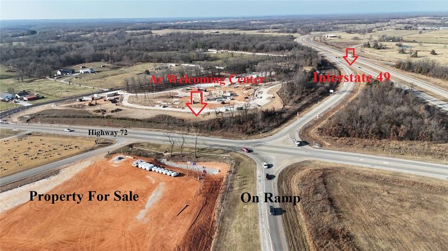 Prime Commercial Opportunity at Exit 100 – Interstate 49

Position your next investment at the center of growth with this 17.56 acres located directly on Exit 100 of Interstate 49—one of Northwest Arkansas’ most highly traveled corridors. Water at street! Sewer on the way from the City of Gravette!

This property delivers the kind of visibility and access developers and investors dream about.

780 feet of on-ramp frontage to I-49

268 feet along Highway 72

1,700 feet of frontage on North Mt. Pleasant Road

Zoned Commercial – ready for development

This site sits in the path of rapid regional expansion, just minutes from the continued growth of Northwest Arkansas. With unmatched access and multi-road frontage, the possibilities are wide open—ideal for retail development, travel center, logistics hub, mixed-use commercial, or investment hold.

Build now or secure your position in the future of Northwest Arkansas