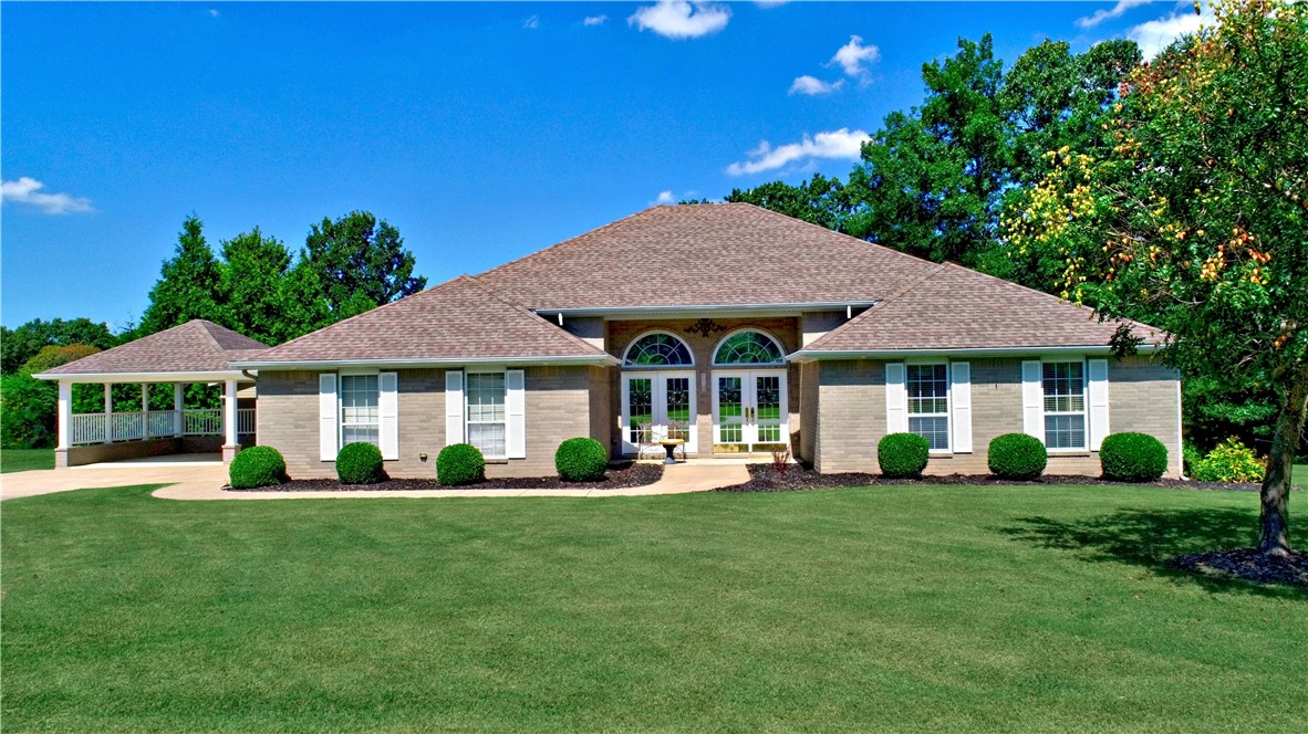 Fabulous move in ready luxurious, designer home with all the right features in East Rogers desirable Lake Atalanta district. 3 Bedrooms, 3 Bathrooms, 3 Fireplaces, 2 Master Suites, Large updated Kitchen with Fireplace & Extra Large Family Room. Open floor plan, Wood floors, New refrigerator conveys, Bosch dishwasher, Motorized shades, Patio, Pergola, Water Fountain, Irrigation system, Underground pet fence, 2 Car Garage, Detached Carport, Large attic with dedicated staircase. Cul-de-sac Home that is close to all that is Northwest Arkansas. Close to Lake Atalanta walking trails and dog park.