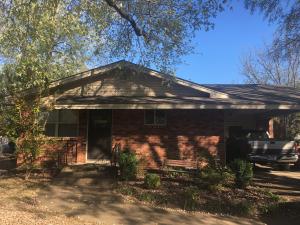 Cute cute cute! 3 bd/1 ba home with carport, fenced back yard and a storage building.