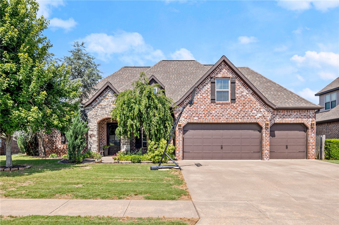 YOU FOUND IT! This beautiful brick home in White Oak Trails is adjacent to Elm Tree Elementary and Ardis Ann Middle School and in close biking distance to Coler Grove and the NWA Greenway. Safely walk your kids to school without even crossing an intersection!
This home has 5 BR and 3 BA, or can be utilized as 4 BR with a bonus room (large 5th bedroom has closets). Upgrades include custom master shower, extended concrete patio and decorative feature walls. Enjoy an open floor plan, double kitchen islands, flat fenced back yard, and ideal location within the subdivision.
White Oak Trails is one of the most welcoming neighborhoods in NWA! You'll get to experience this community with neighbors during 4th of July events, Trick or Treating, regular Bike nights, and so much more. Access to the neighborhood pool is included as part of the HOA dues and offers a zero-entry shallow end, covered pavilion, restrooms, and both sunny and shaded lounge chairs.
Hot Water tank replaced 2020; HVAC maintenance and upgrades 2023.