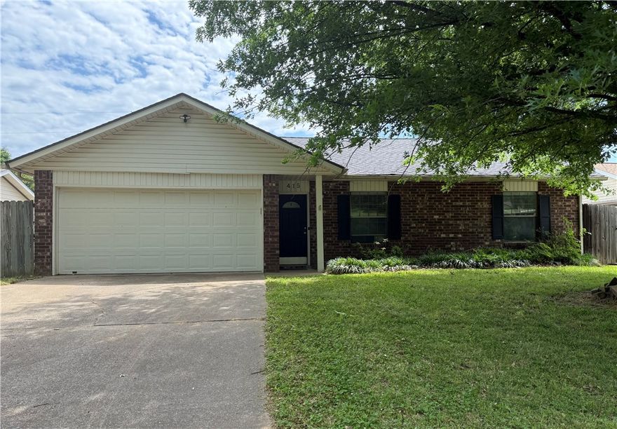 Move-in ready 3BR/2BA home located in a quiet neighborhood just minutes from both John Brown University and Siloam Springs Middle School! This home features a new roof, fresh interior paint, and new carpet throughout the bedrooms. Enjoy wood flooring in the living area and kitchen, complemented by granite countertops in the kitchen. The privacy-fenced backyard and covered patio provide a great space for relaxing or entertaining. Convenient location with easy access to schools, shopping, and dining! Would make a great first home or investment property!