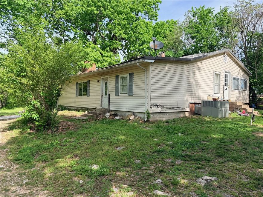 3 bedroom, 1 bath home in Bellefonte. (2nd bathroom needs repairs.) Lots of space inside with a wood fireplace, wood, tile and carpet flooring. Newer metal roof. Outbuilding has electric. Nice level and shaded yard. The wood stove in front of fireplace does not convey. Selling AS-IS. All numbers approximate.