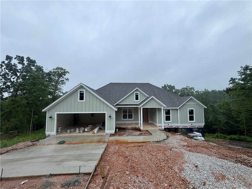 Come see this rare, just over an acre property that boast a prime location, right next to a bike trail! Bella Vista at its finest!