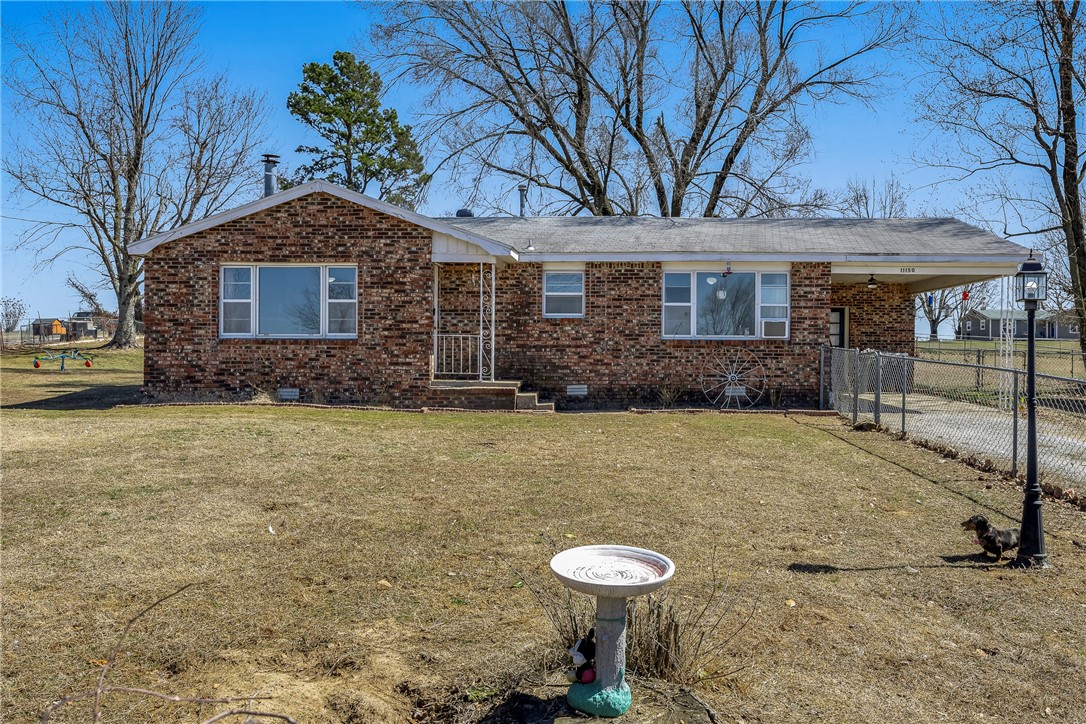 This well maintained home is sitting on a large .83 acre lot with a fenced in backyard that is perfect for first time home buyers. It is just minutes from downtown Elkins and about 25 minutes to the heart of Fayetteville. Shed conveys with the property. Please provide proof of funds or pre-qualification with all offers. Ring doorbell and outdoor cameras do not convey