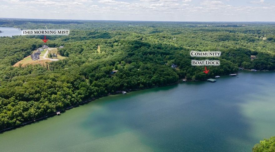 Nestled in the surroundings of Beaver Lake, this stunning property features a custom home built in 2021 & a 32’ slip in a community dock w/ a hydra hoist lift! The home offers 3,991 heated sq/ft & includes 4 bedrooms, 3.5 baths, open eat in kitchen to living, butler’s pantry, study, game room, laundry, & bonus. Other amenities include a Chef’s kitchen w/ a 48” gas range, custom white oak cabinets, custom vent hood, tons of cabinet storage, quartz countertops, double islands, pot filler, 2 bedrooms on the main level, dog bath in the laundry room, and vaulted ceilings. There's more outside! Huge covered patio w/ an outdoor kitchen w/refrigerator, trash bin, 36" grill w/ a rotisserie & a Traeger Smoker! WOW! That's not all! A hot tub, an Anvil & Oak fire table, a roof top deck w/ beautiful lake views, & a 3 car garage. Community amenities - Clubhouse w/bathroom, basketball/tennis court, & a common generator. This home is perfect for primary residency or a weekend lake home & even better it is MOVE IN READY!