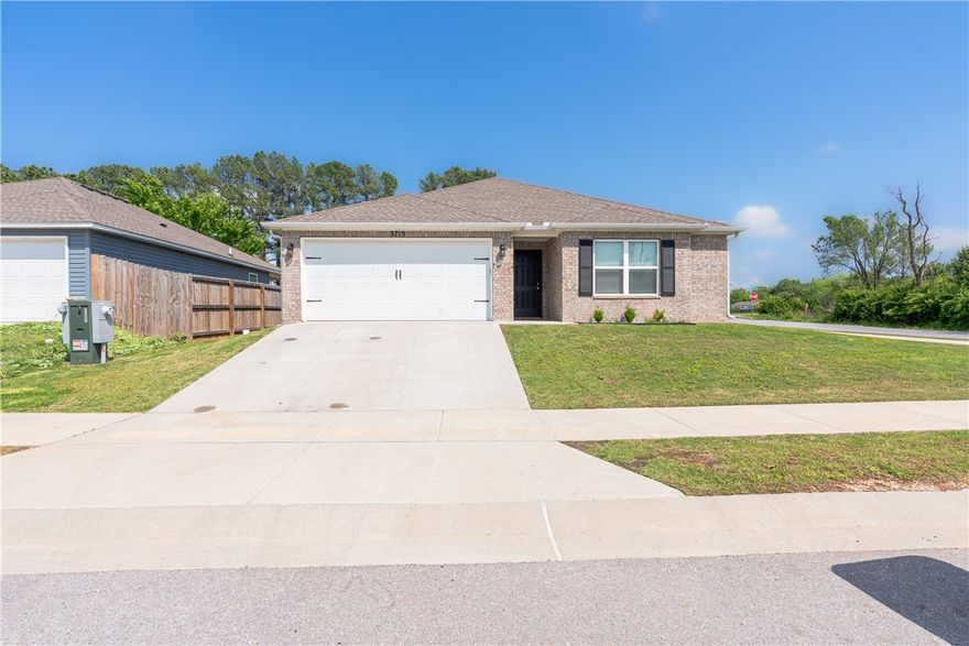 Welcome to Rogers AR! This beautiful home is a spacious 4 bedroom 2 bathroom home. All counters throughout the house are granite countertops. To make it even better this home sits on a corner lot. Close to Fitness One in Lowell AR.