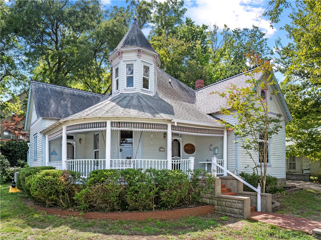 Step back in time with this enchanting 1893 Victorian Queen Anne, a true jewel on the historic register. Rich in character, this 7 bed/6 bath home is graced with stained glass windows, gleaming hardwood and marble floors, claw foot tubs, and a sunlit solarium.
Imagine sipping tea on the partial wraparound porch or walking through the courtyard that links the main house to the charming carriage house. Once a beloved bed & breakfast, this property radiates warmth and possibilityāwhether as your private haven or as a place to welcome guests into its storied embrace. The 2-car garage and front parking lot provide ample space for guests.
This historical home has had several recent updates such as new AC, water heater, and upgraded water lines, a full list of improvements can be made available upon request.