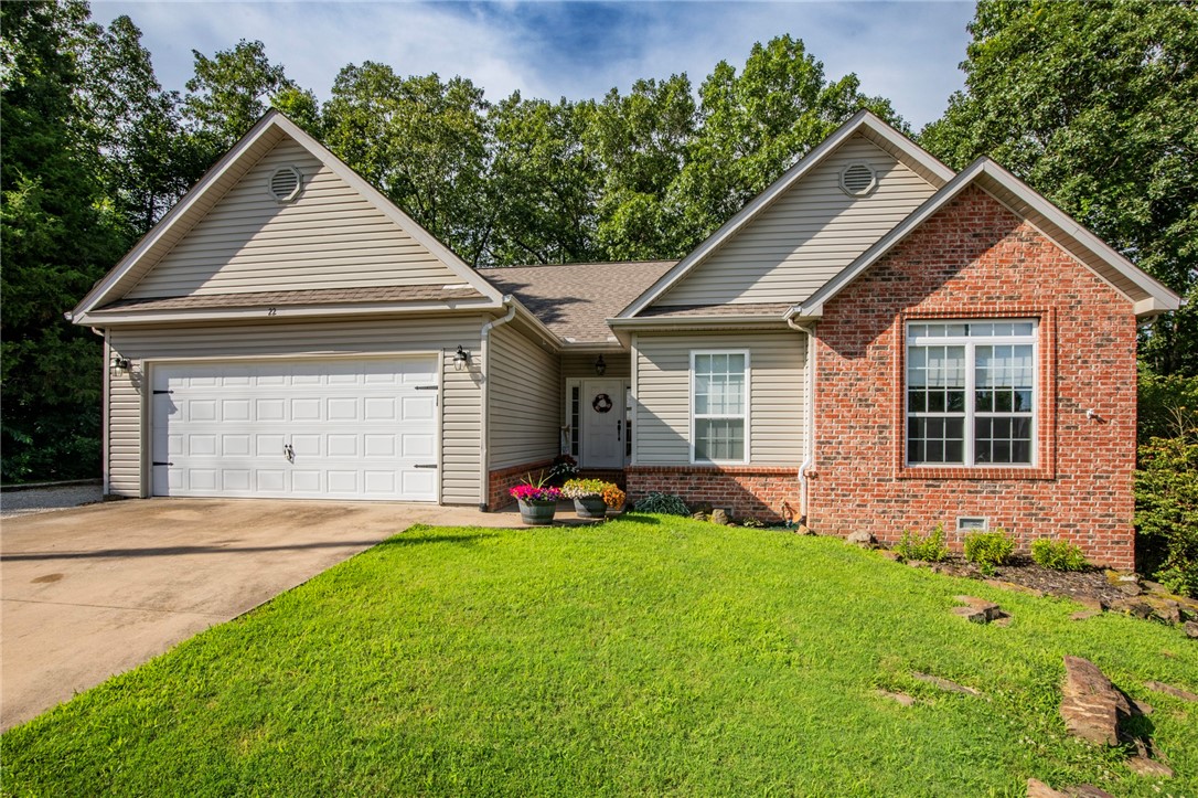 Welcome to this beautifully maintained one-level home in the sought-after Witherby area, located in the highly desirable Bentonville School District! Offering 3 spacious bedrooms and 2 baths, this home features an open, airy layout with vaulted ceilings, great natural light, and absolutely no wasted space. You’ll love the stunning new LVP flooring throughout—no carpet here—and the spacious kitchen with upgraded appliances, a gas cooktop, and a custom-size refrigerator that conveys. Step outside to a fabulous covered deck overlooking a fully fenced backyard with a charming firepit area! Added gravel on the side provides extra parking, and the home offers excellent storage underneath. It also sits on sewer and had a new roof installed in 2021 for peace of mind. The location truly can’t be beat—close to schools, medical facilities, shopping, and just minutes from the Metfield Recreation Area, numerous trailheads, and the Blowing Springs Greenway. This gem combines comfort, style, and convenience all in one!