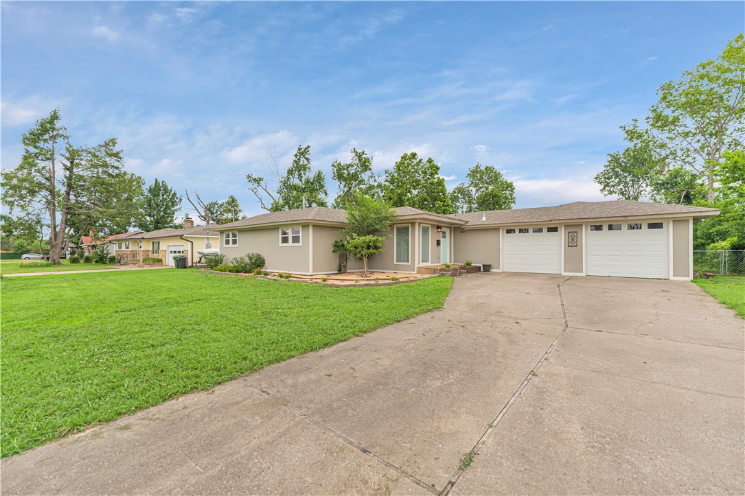 This updated 3-bed, 2-bath home offers nearly 1,800 sq ft of charm, function, and flexibilityānestled on a rare .76-acre lot with no HOA. Thoughtful upgrades include a new roof, HVAC, fiber cement siding, updated windows, blinds, and a sliding glass door with cellular shade. Enjoy multiple living areas, a bonus room with a barn door, and zero carpet throughoutāperfect for allergies and low-maintenance living. Outside, a new deck and fresh landscaping create the perfect place to unwind. The oversized 4-car garage with workshop space is ideal for hobbyists, gear storage, or home-based businesses. This property has room to grow with T3.1 zoning allowing duplexes, multi-unit homes, and more. Park trailers, build additional structures, or enjoy the freedom without restrictions. Located minutes from downtown, trails, and top-tier amenities, this home stands out for those wanting space, potential, and peace of mind. OPEN HOUSE July 2nd, 2025 from 4-6 P.M. Also listed as MLS #: