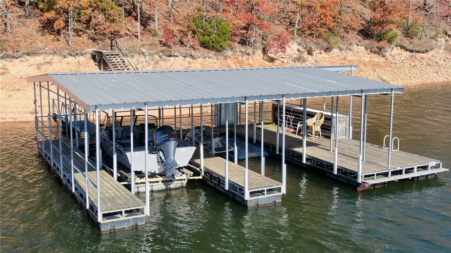 Live beside Beaver lake lake in this 4,411 sqft 4 bed, 4 bath, private oasis on 5+ acres of pure beauty with private dock and over 500ft of shoreline, you won’t be disappointed. You will discover this solid built full brick home has a open concept floor plan that flows with ease and is outfitted with 3 master suites and office all on main level, solar passive design and a plethora of updates and upgrades throughout. Massive second living space is situated in the walk out basement, lots of storage too. No covenants or restrictions, do as you wish, live year-round in paradise or use as a vacation rental. Equipped with low corp line so you can drive four-wheeler down or take the steps to access your private 2 slip dock, plenty of space for all the toys with the 30X20 Quasi metal building; did I mention wired for a whole house generator, gated entry, 3 car garage… About a minute by boat to Prairie Creek Marina, 20 min to Downtown Rogers, 30 min to Wal-mart Home office so convenient too. Call today!