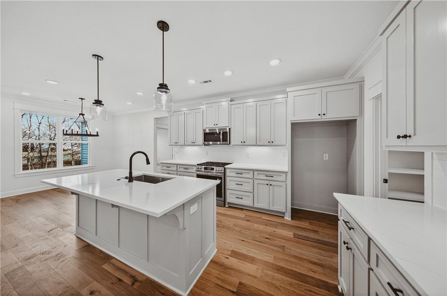 Built by a popular Bella Vista builder, this spacious 2-bedroom, 2-bath home in Rosenheath Subdivision (BVV) also includes an office with a closet and a large flex room—perfect for a growing family, work-from-home needs, or extra living space.  

You’ll love the all-wood flooring and tile throughout for a clean, modern look and easy maintenance. The open floor plan seamlessly transitions into a bright kitchen, featuring quartz countertops, high-quality finishes, and a functional layout that supports everyday living and entertaining. Added upgrades like a central vacuum system and an epoxy-coated garage floor. 

Included appliances: microwave, dishwasher, and gas range. Additionally, two 50-gallon propane tanks located on the side of the home will be included, adding value and enhancing move-in readiness.

Situated on a lot with a flat front yard, this home combines comfort, flexibility, and standout builder quality. Schedule your showing today and see why this Bella Vista home is a great fit!